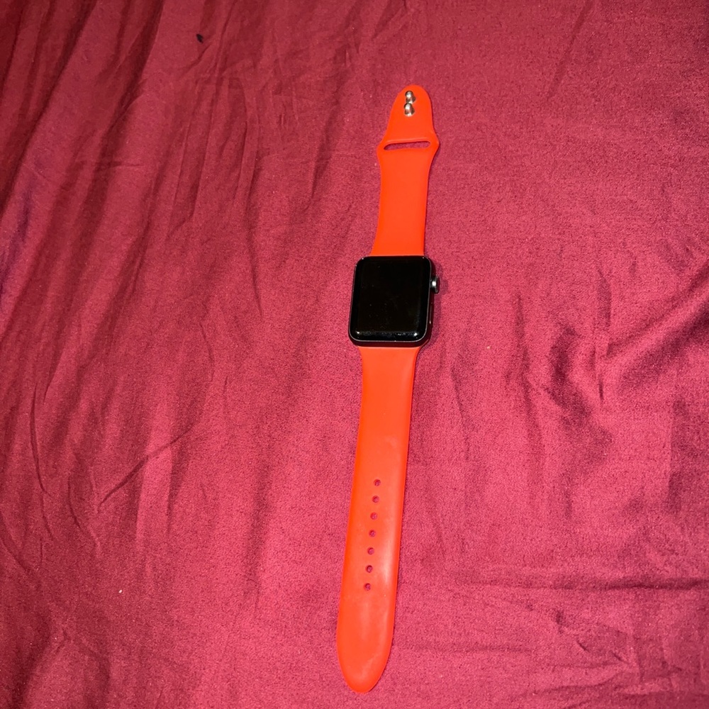 Apple Watch Series 3. 42mm. Comes with a charger
